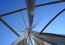 the geometrical play of the grace of the archways meeting the triangles of the poles