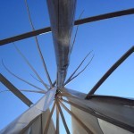 the geometrical play of the grace of the archways meeting the triangles of the poles